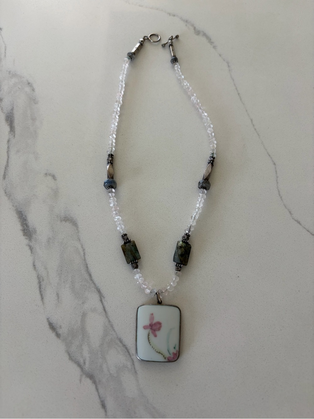 Handcrafted White Bead Necklace with Floral Pendant